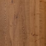 Close-up view of AMALFI RUSTIC flooring showing unique finish details