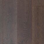 Close-up image of STONE GRAY RUSTIC flooring showing unique finish details