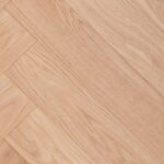 Close-up view of HERRINGBONE SELECT flooring showing detailed pattern and surface design