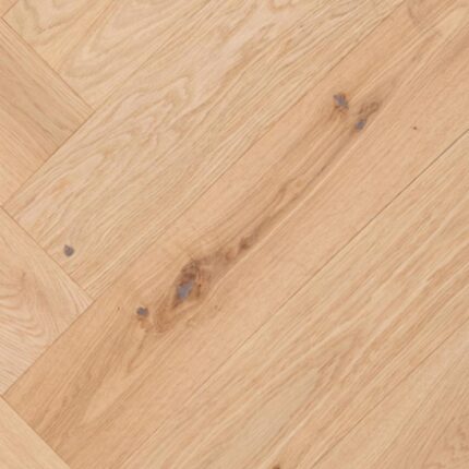 Close-up view of HERRINGBONE RUSTIC flooring showing detailed pattern and surface texture