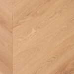 Close-up view of CHEVRON 45° SELECT flooring showing detailed geometric pattern